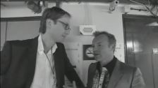 Graham Norton talks to Stephen Merchant backstage at the Ball